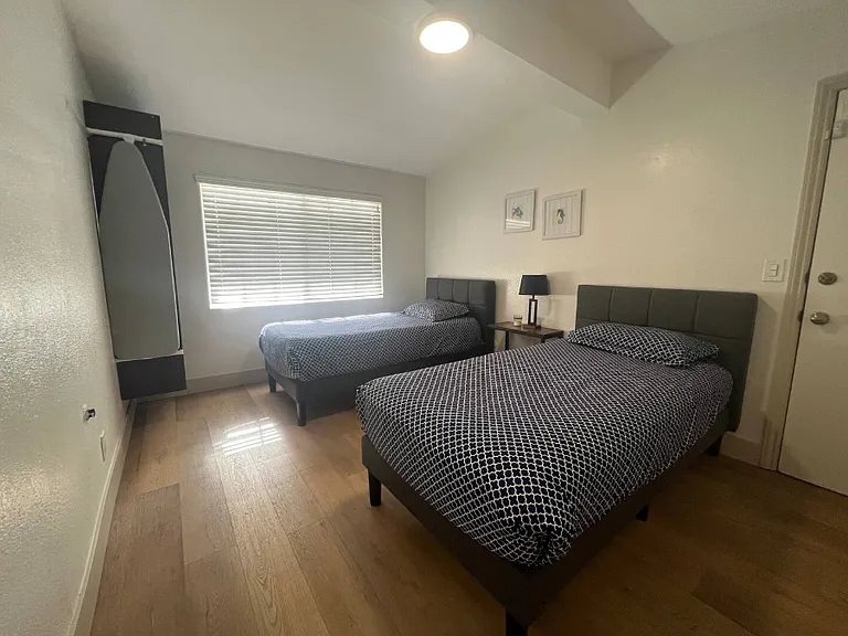 Bedroom 4 with two twin mattresses.

*Bedroom 3 image unavailable at the moment.