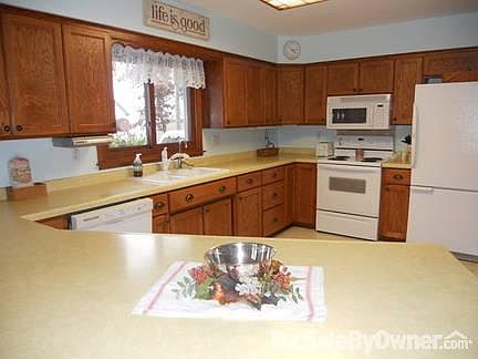Kitchen
						:
						This large kitchen was added onto the house in the late 1970's