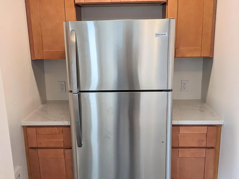 Fully renovated kitchen, brand new stainless appliances, cabinets, tile, and quartz countertops