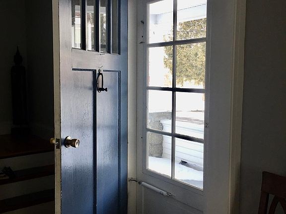 Come in . . . entrance with original doors