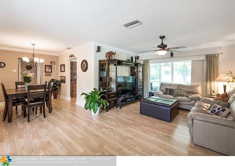 Beautifully remodeled home. Hurricane Impact windows and sliding doors. laminate throughout home.