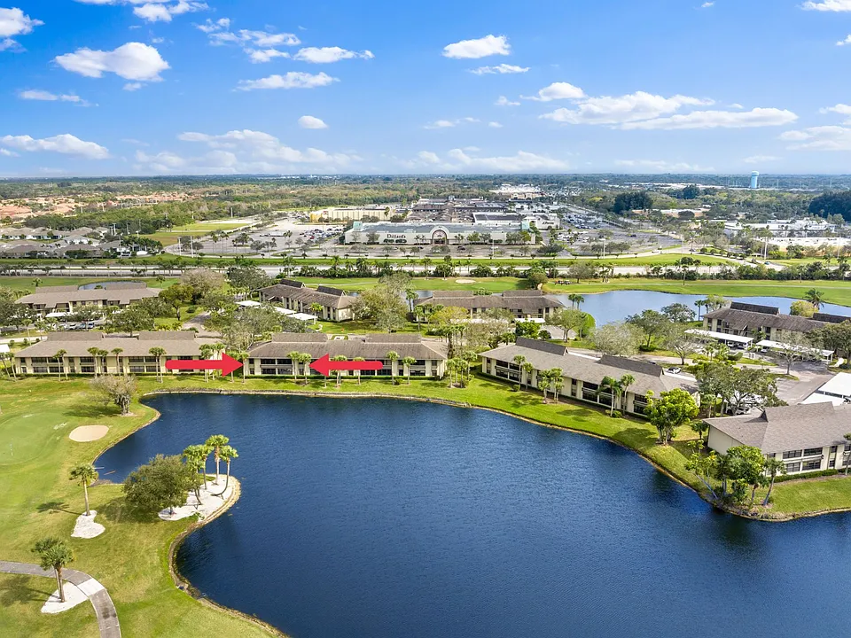 END UNIT! Stunning expansive lake & golf course views to enjoy!
