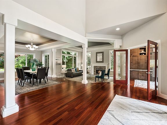 Gleaming Hardwood Floors & Exposed Beams Compliment this Entry Way>