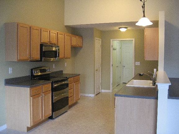 6 - Kitchen looking to Laundry - Garage entry