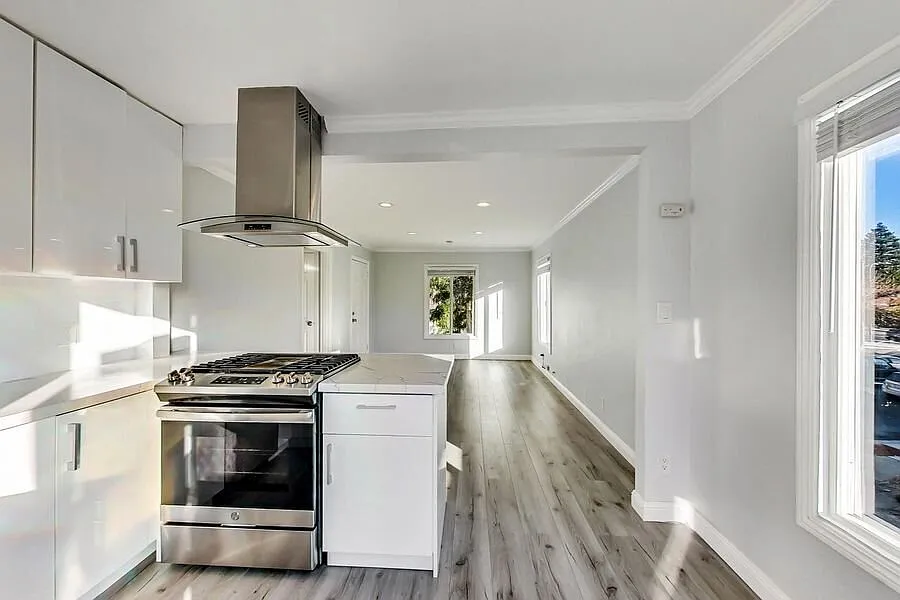 Nicely Remodeled with Modern Kitchen, Laundry in Unit and Parking! — Photo 1