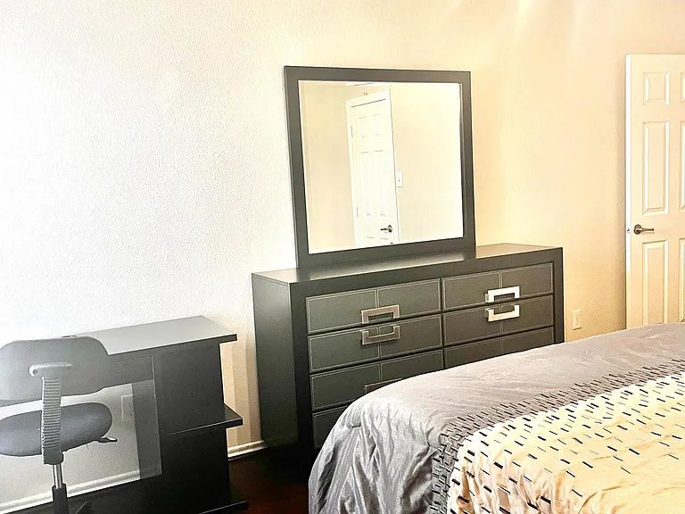 4th Bed room -upstairs-queen bed, work desk, chair, dresser, mirror, night stand.