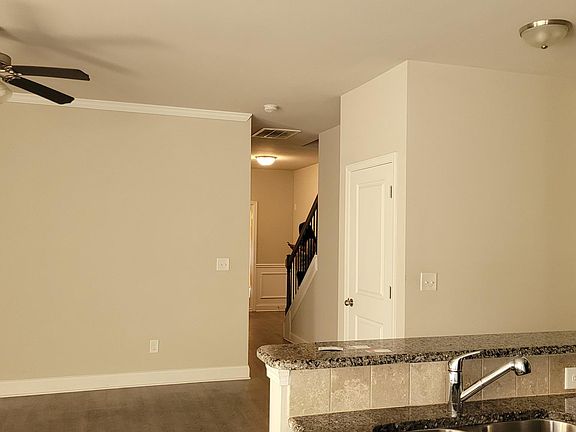 view of living room and hall way fomr kitchen.