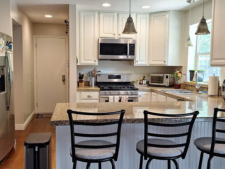 kitchen with granite counters and stainless steel appliances