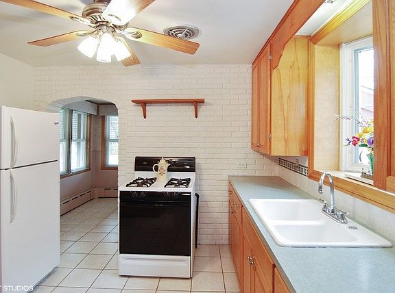5th image of 5640 S Natoma Ave