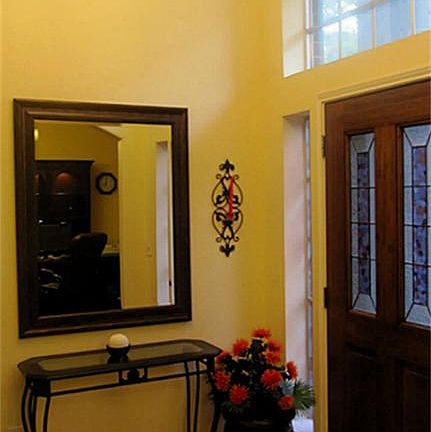 Upgraded light fixtures are throughout the home...look at this beautiful chandelier.