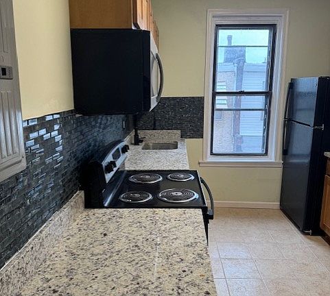5th image of 5712 Arch St Floor 2