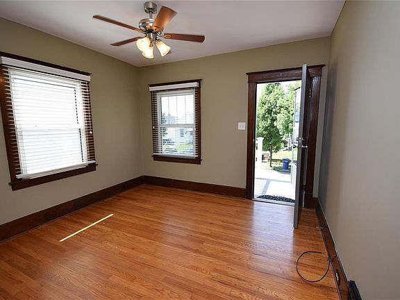 Large living room off the front entrance gets lots of natural light