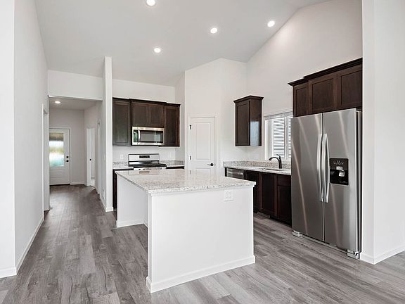 Kitchen with granite countertops and stainless steel appliances