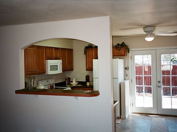 From LR into Kitchen and French Doors To Outside