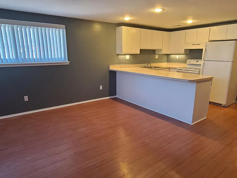 Living area, looking toward kitchen.