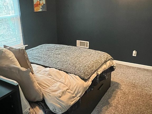 Private Bedroom with a queen bed, reading nook, and closet,