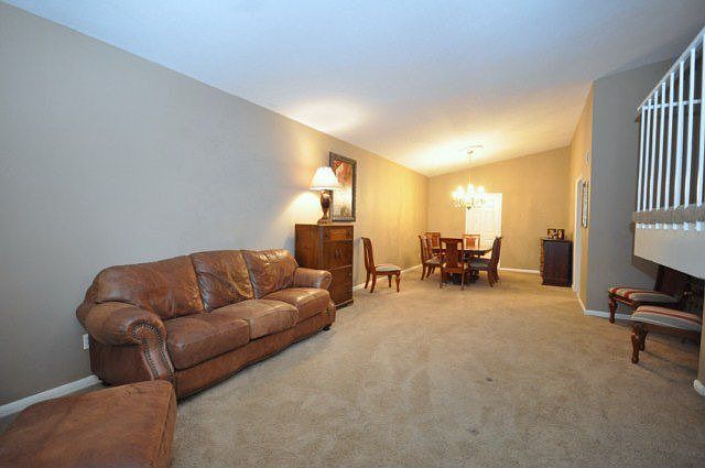 A view of the formal living and formal dining together.