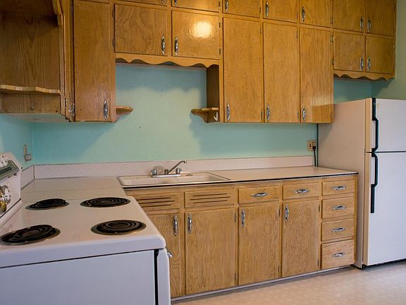 Kitchen view, plenty of cabinets.