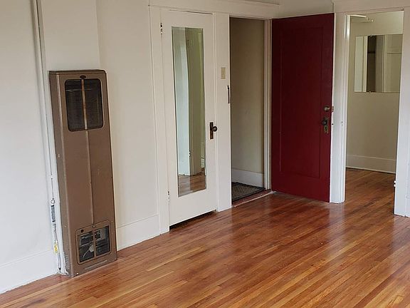 New paint, newly refinished natural hardwood floors