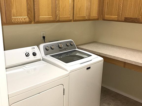 laundry room with washer and dryer