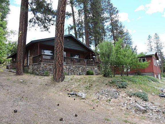 Front area view of house and garage, work shop off