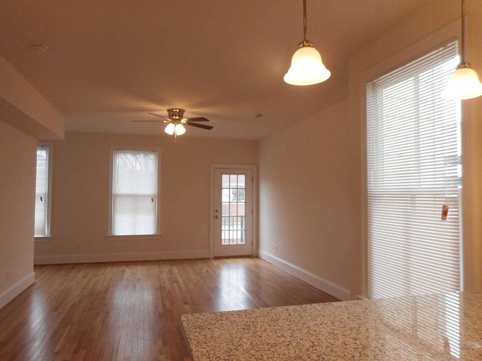Open floor plan leads to balcony