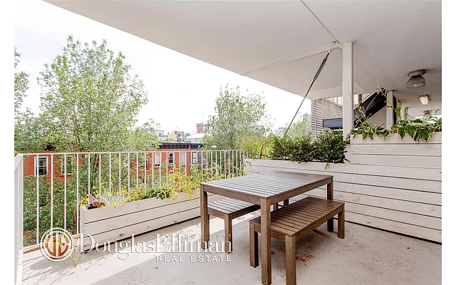 Sold by Douglas Elliman | media 18