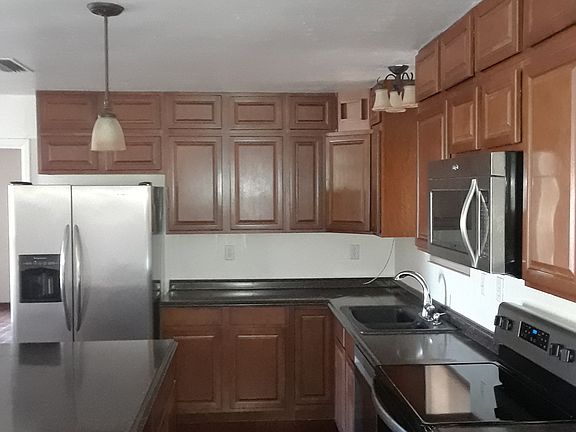 Stainless side by side to replace white fridge.
