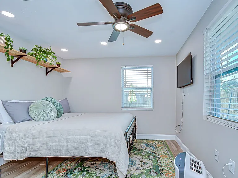 King size bed, 32" smart tv, end stand and large closet