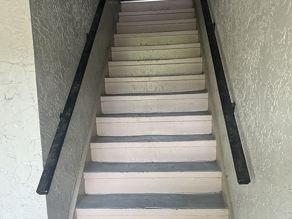 The stairs leading up to the front door.