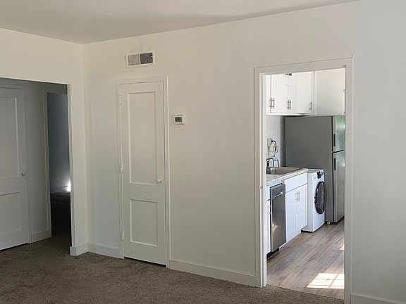 Living room looking into kitchen