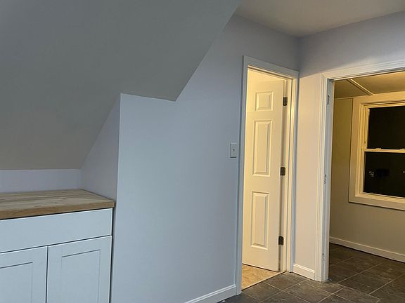 additional cabinet/ bathroom door / door to laundry/back room (door has been temporarily removed)