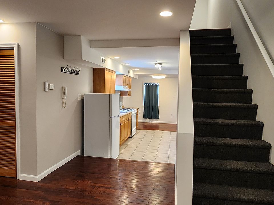 Living Room to Kitchen and Upstairs