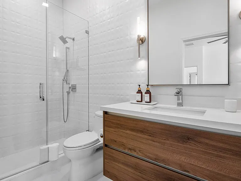 Step into a modern sanctuary, where sleek finishes and thoughtful details make every refresh feel indulgent.