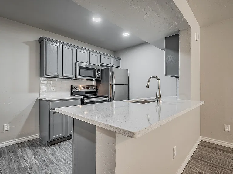 Step into this stylish kitchen featuring premium finishes and a functional layout.