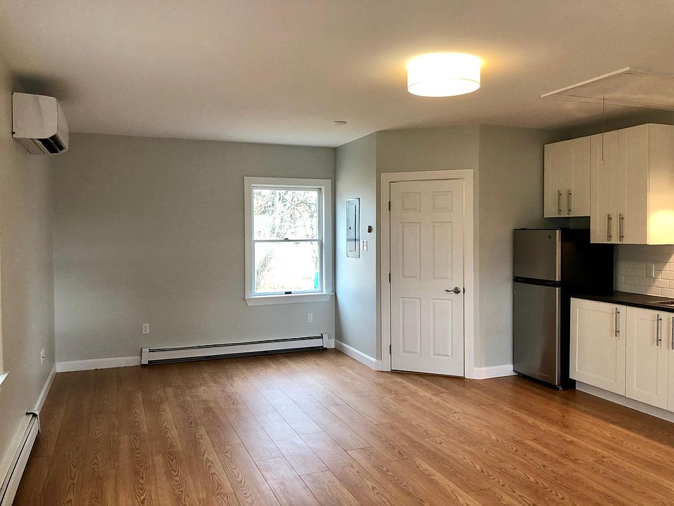 Looking towards back of apt - bathroom door on right in corner.