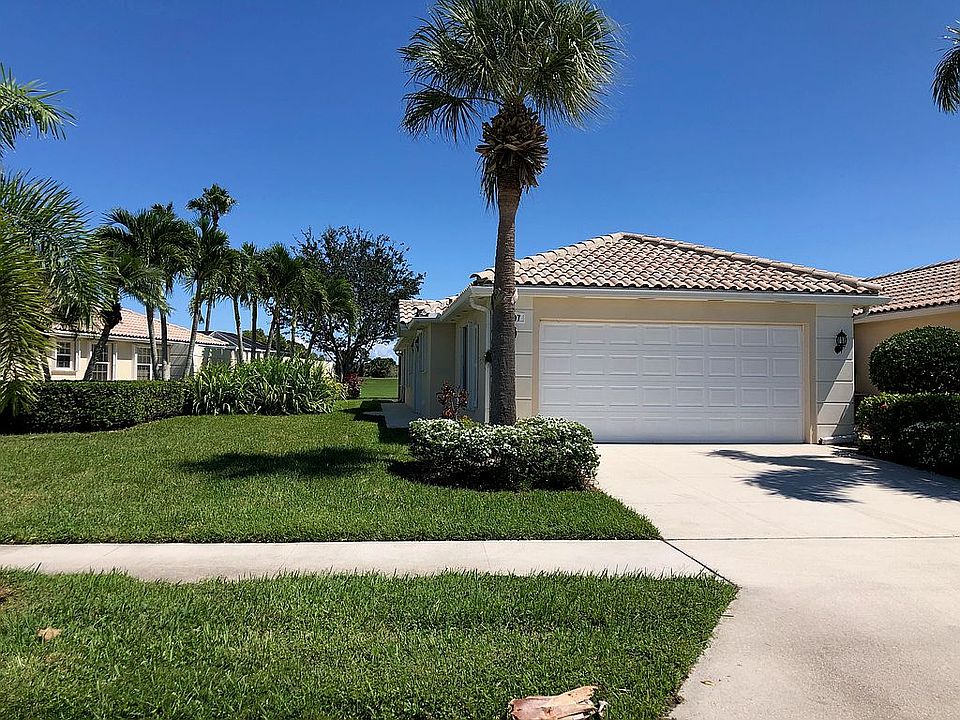 1st image of 8297 SE Paurotis Ln