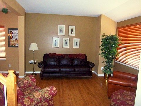 Warm Neutrals & Large Window Overlooking Front Yard