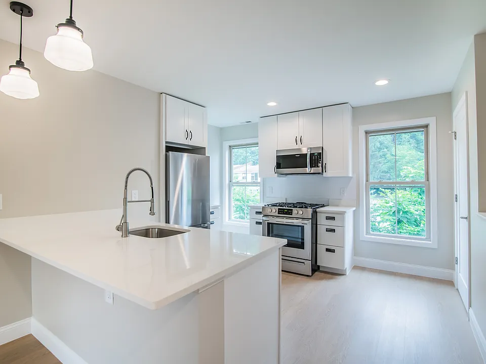 Welcome to Waterfront at the Strand, where modern design meets comfort. This stunning kitchen features sleek finishes, ample natural light, and a spacious layout perfect for culinary adventures. Schedule your tour today and envision your new home!