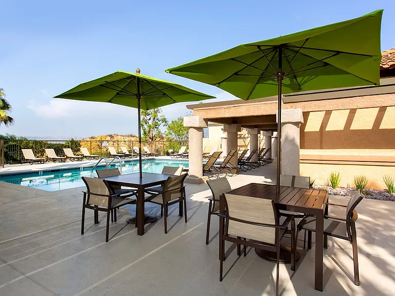Lucera pool and sundeck with tables