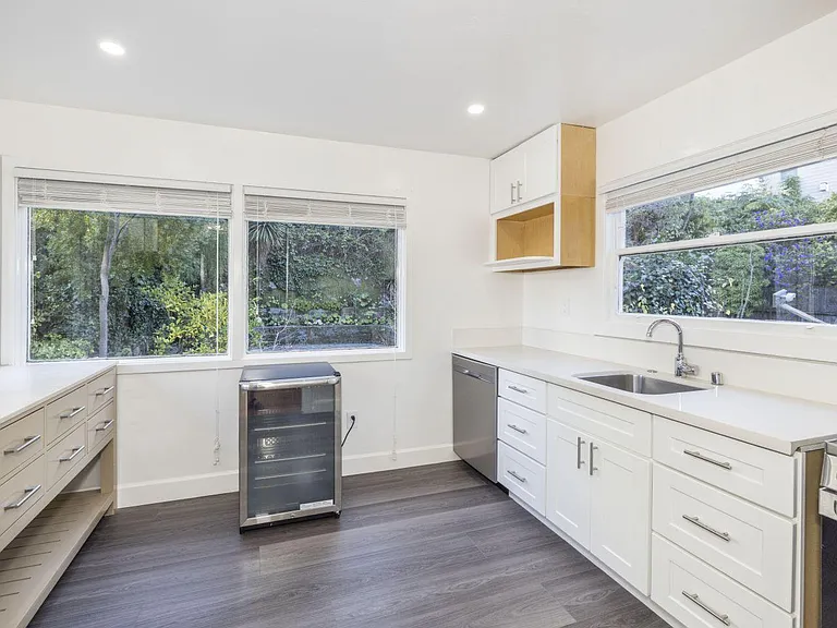 Kitchen with backyard views