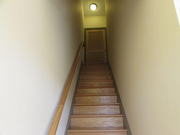 Steps to laundry and loft bedroom