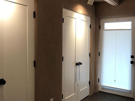 Living area 2 closets and front door