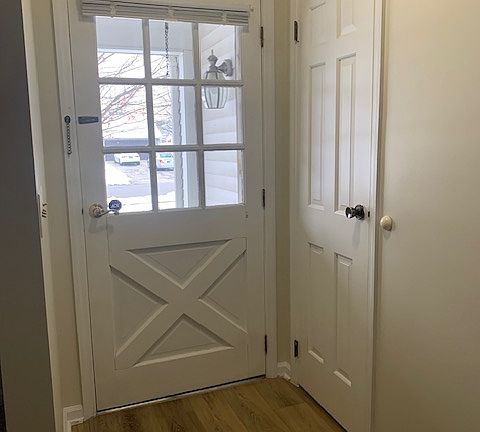 front door with coat closet