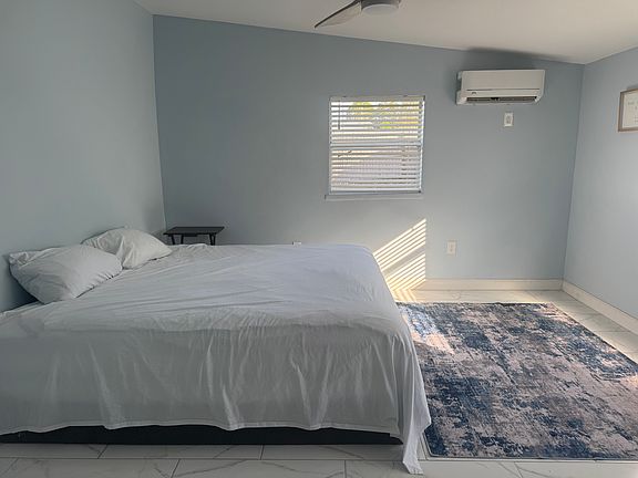 Master Bedroom with king size bed. Bed will be removed upon request.