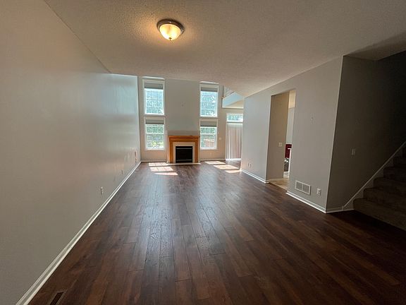 Living room with gas fireplace and amazing vista.