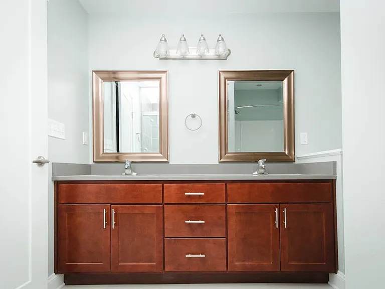 Double vanities - En suite master bathroom attached to master bedroom