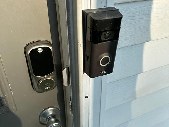 Hardwired Ring secuurity camera and keyless yale entry.