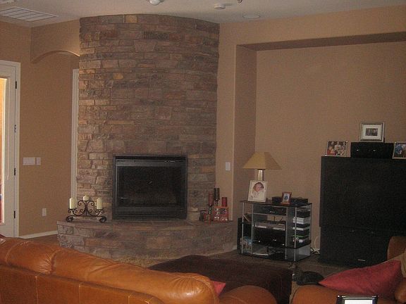 Family room with stone fireplace