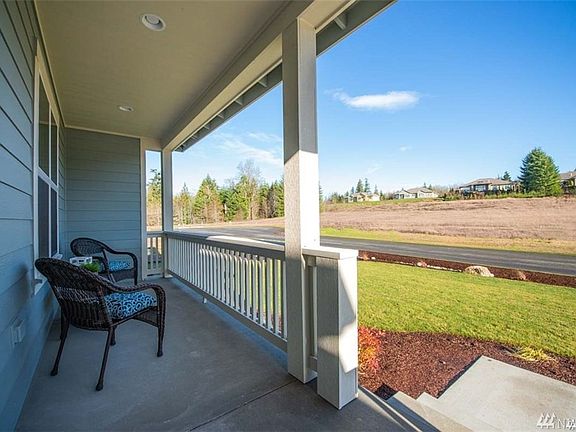 Plenty of space for sitting and enjoying the community. PHOTO OF SIMILAR HOME ON NEARBY LOT>